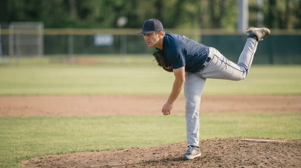 Pitcher in throwing deceleration after ball release.