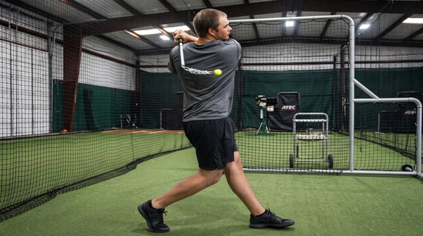 Athlete maximizes bat head speed through the hitting zone with the SpeedChain® Batting NOS