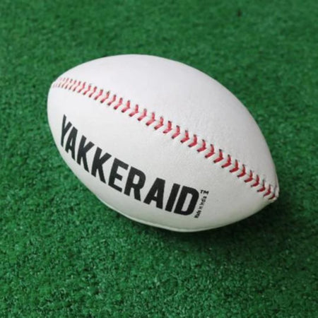 Side-angle close-up of the Yakkeraid training ball showcasing its shape and surface texture