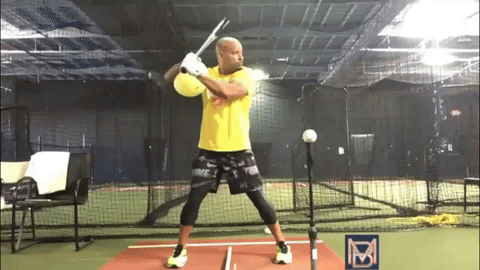 Manny Ramirez trains with the TAP® Connection Ball, maintaining hand connection to his body throughout his swing to refine mechanics and improve bat control.