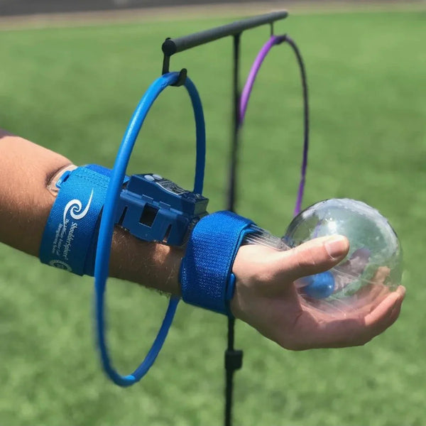 Athlete using the ShoulderSphere® with the Coaching Rings during a dynamic shoulder training session