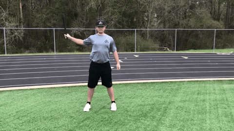 TAP Bell Club used in Shoulder Mobility Exercises. The athlete is performing a one arm shoulder cast swing which helps to open up the shoulder while dynamically stretching the pecs, internal rotators, and anterior shoulder.