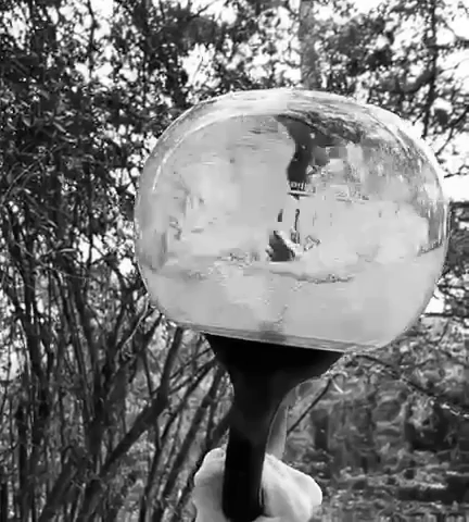 GIF of KHAOS® Waterbell with fluid resistance, sloshing inside as it's gripped, creating an unstable load for strength training