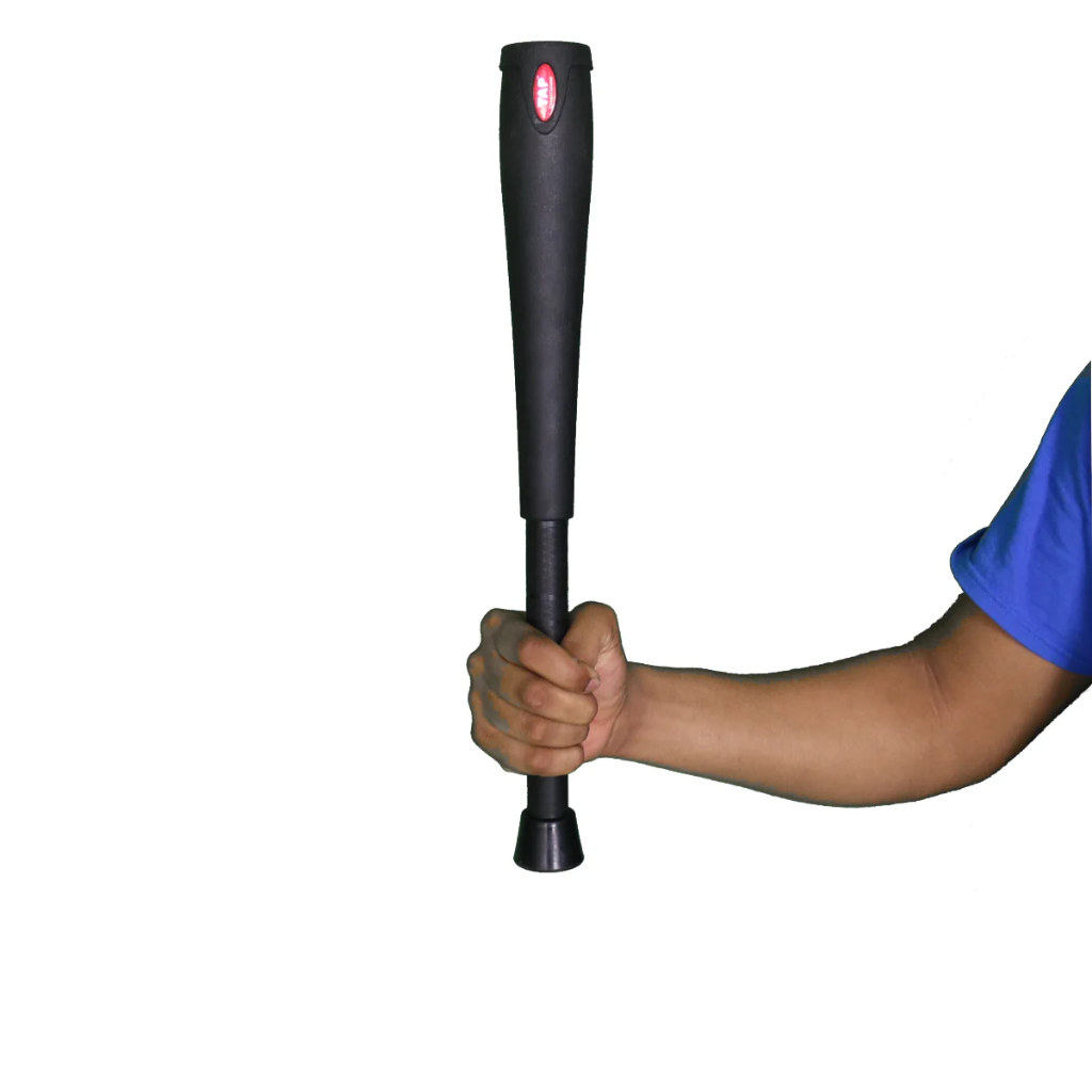 TAP Bell Club 2.5KG being held straight up in one arm demonstrating the leveraged weight.