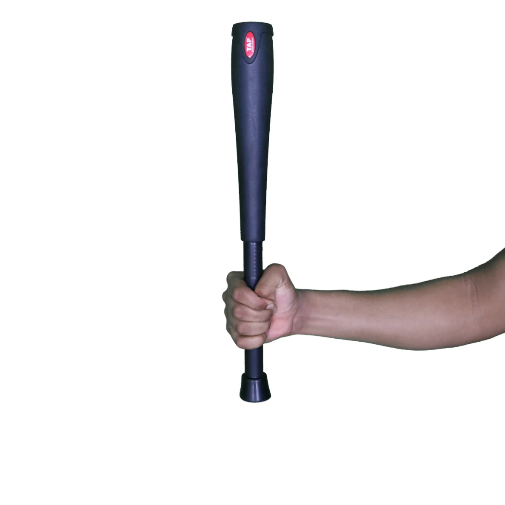 TAP Bell Club 2KG being held straight up in one arm demonstrating leveraged weight.