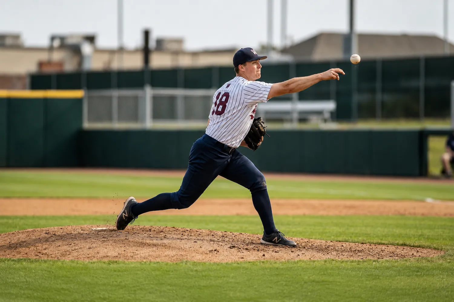 Pitcher delivers a pitch during a regular season games.