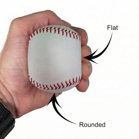 Spinaid being held in hand highlighting the flat and rounded sides of the product
