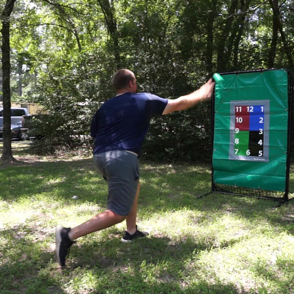 Weighted Baseball leaving hand from throwing position