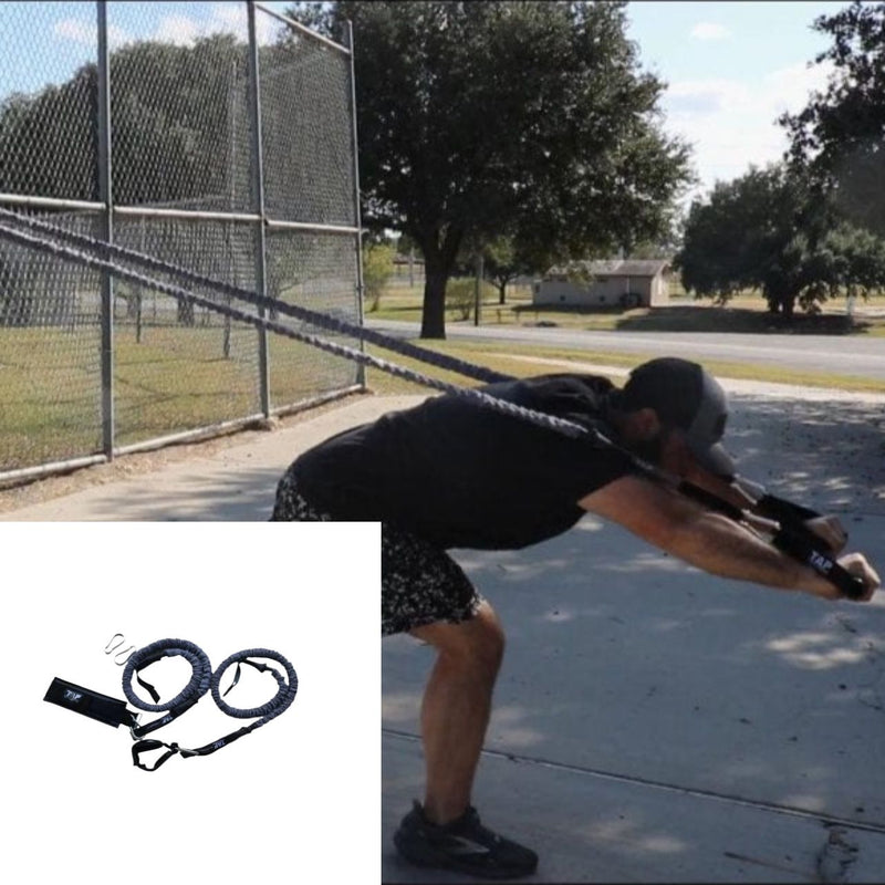 The TAP® Sheathed Safety Tubing in a controlled stretch. The heavy-duty fabric sleeve protects the internal latex core from environmental wear and serves as a mechanical stop to ensure the athlete operates within a safe elastic range for long-term athletic development.