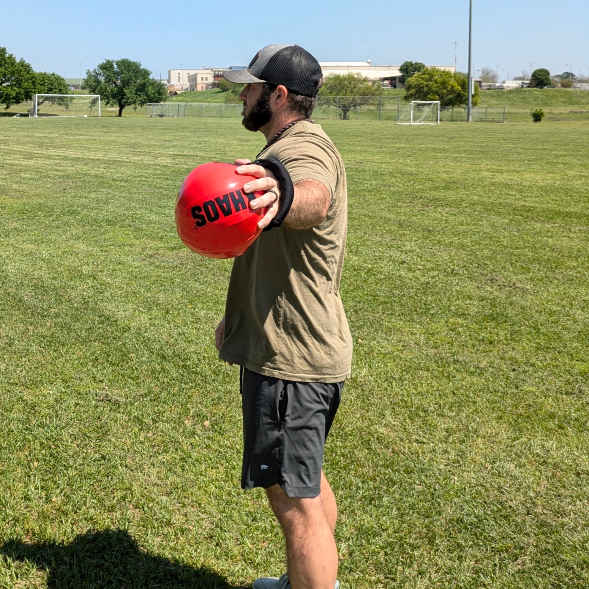Discover how a water-filled mini aqua can be used for dynamic shoulder warm-ups and arm strengthening. Observe an athlete performing perturbation exercises for effective muscle activation.