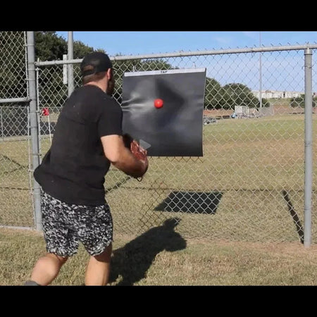 Plyo Mat absorbing a throw from the 7oz Max-Grip Weighted Ball