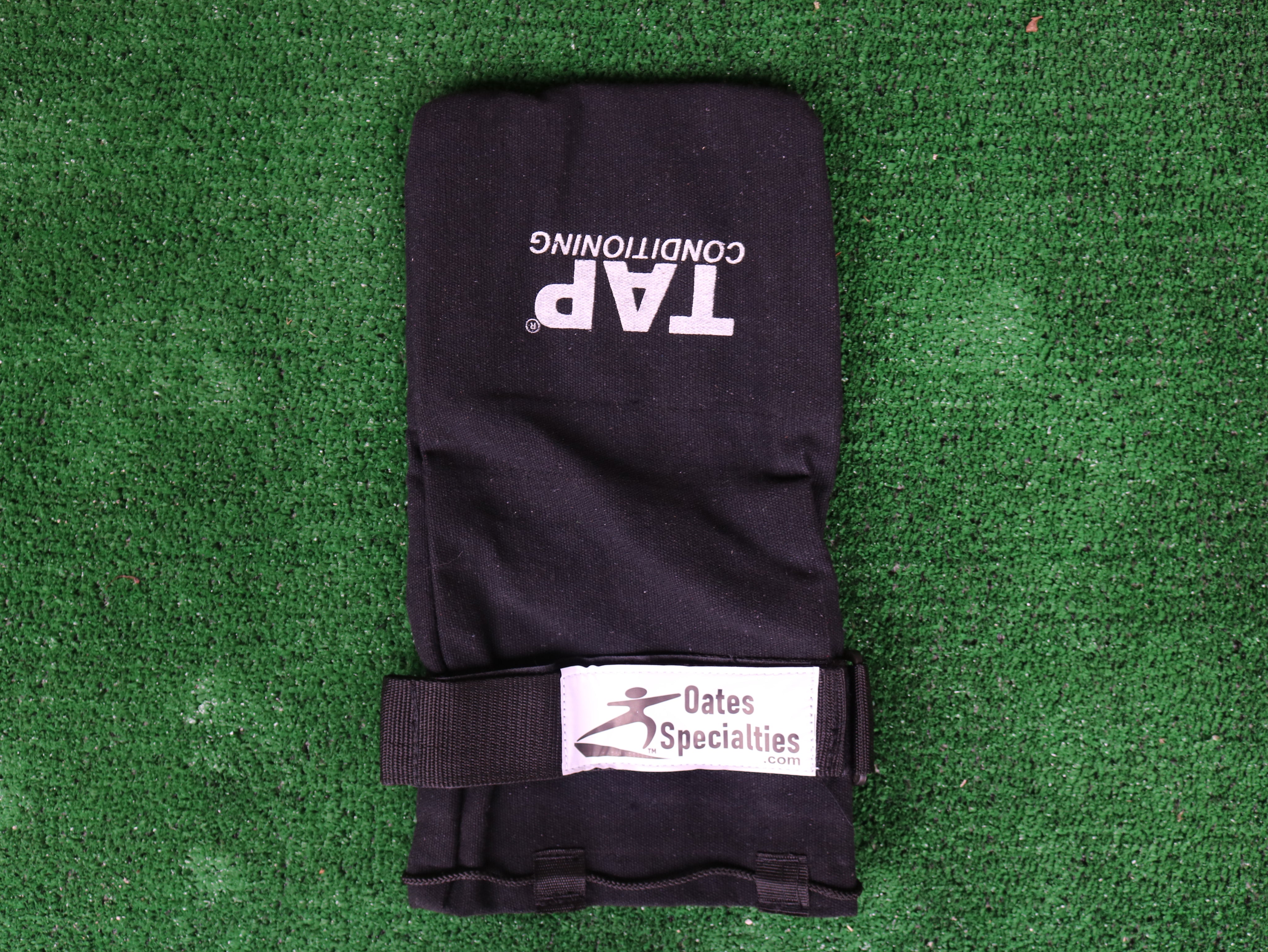 Product photo of the Baseball Training Sock highlighting all features including the new adjustable wrist strap.