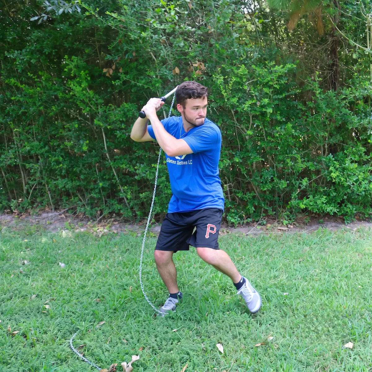 Baseball player in batting stance holding SpeedChain® Batting Chain before starting swing.
