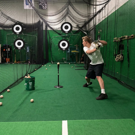 TAP® Batting Target set up in a batting tunnel to provide hitters with visual focus and performance goals during swing training