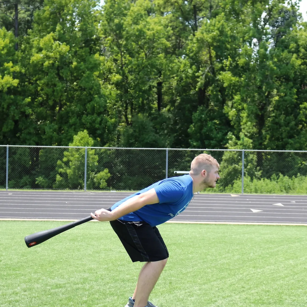 The athlete is using a heavier Bell Club to swing on the outside of the body. He is using his hips, glutes, and core to swing the bell club forward. This really increases strength in the posterior chain. 