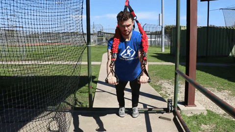 A GIF of an athlete executing suspended push-ups with the KHAOS® Bungee Suspension Trainer, engaging core stability and upper-body strength while adapting to dynamic resistance from shifting bungees.
