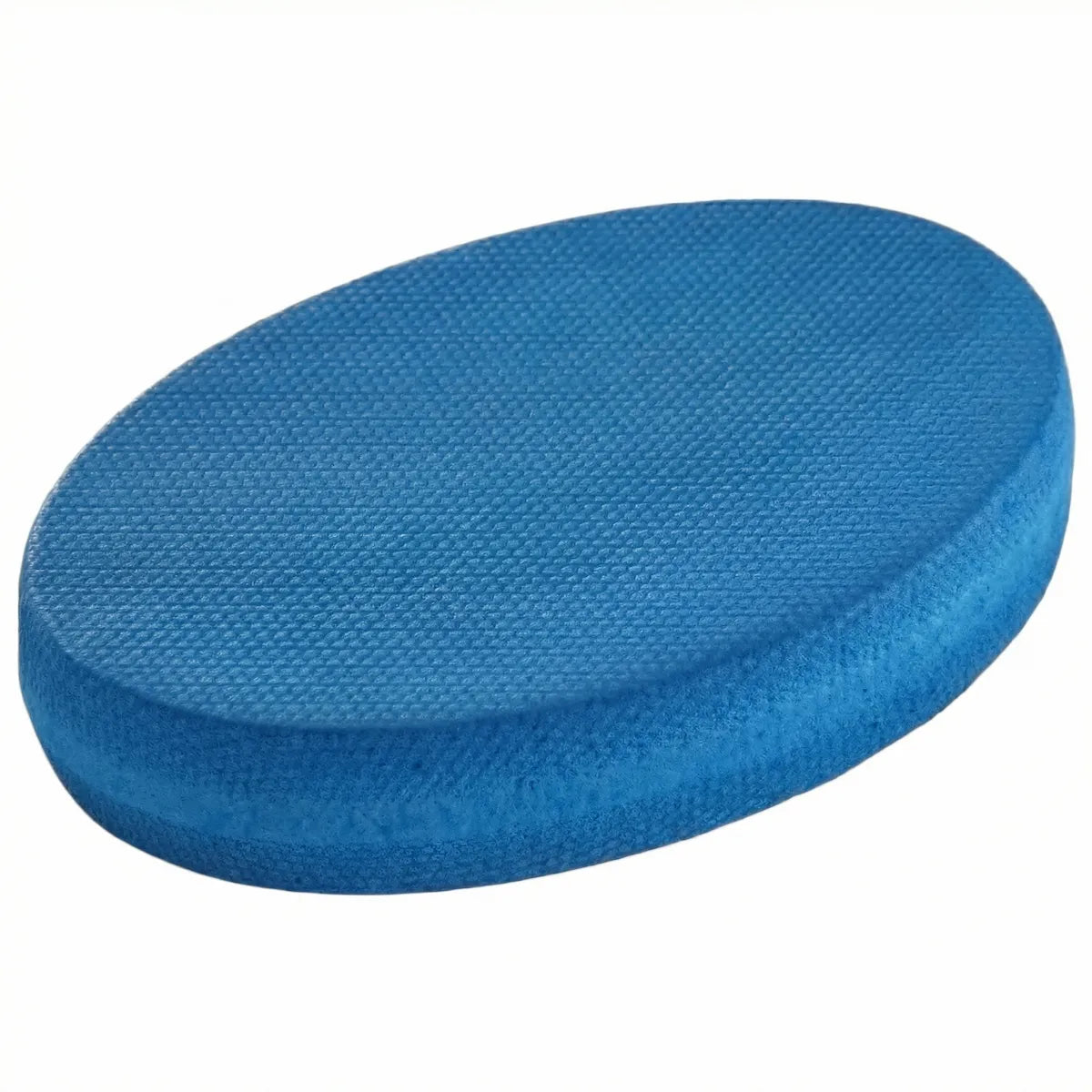 Oval Balance Pad featuring a firm, textured surface, designed to provide an unstable variable stimulus for lead-side stabilization and kinetic chain organization for increased power.