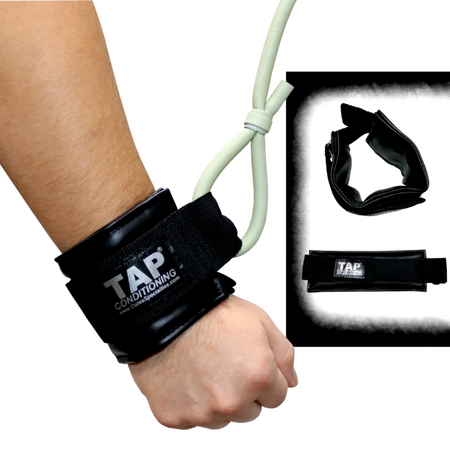 Close-up of the synthetic leather cuffs on the TAP® Pitcher's Friend, illustrating the contoured design for distal unloading. The non-porous, padded interface is engineered for a secure fit at the wrist, allowing for efficient sanitization and a seamless "grab-and-go" transition in high-traffic team environments.