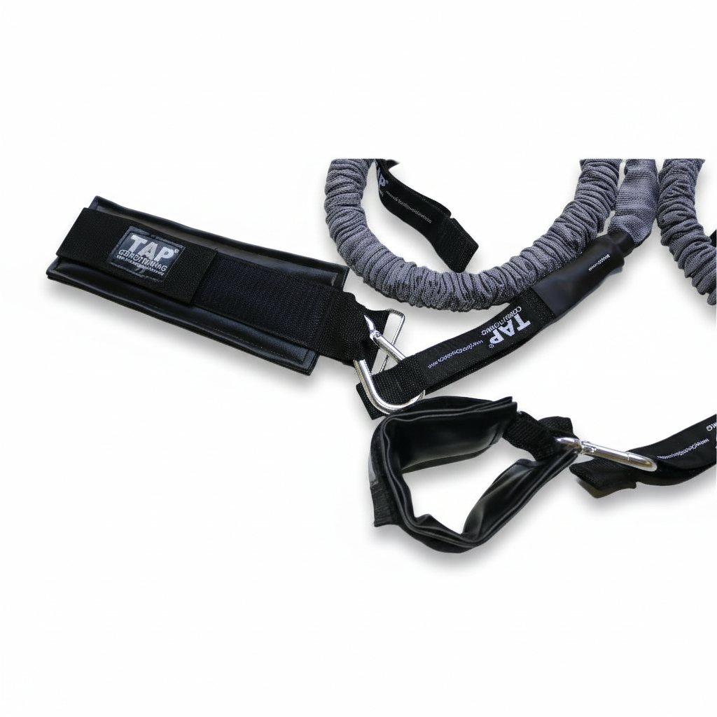 A close-up of the TAP® synthetic leather wrist cuff, designed for distal unloading. The non-porous material allows for rapid sanitization between users in high-traffic environments, while the reinforced stitching and heavy-duty steel snap-hooks provide a secure, low-friction connection for isolating the scapular stabilizers and posterior rotator cuff without grip compensation.