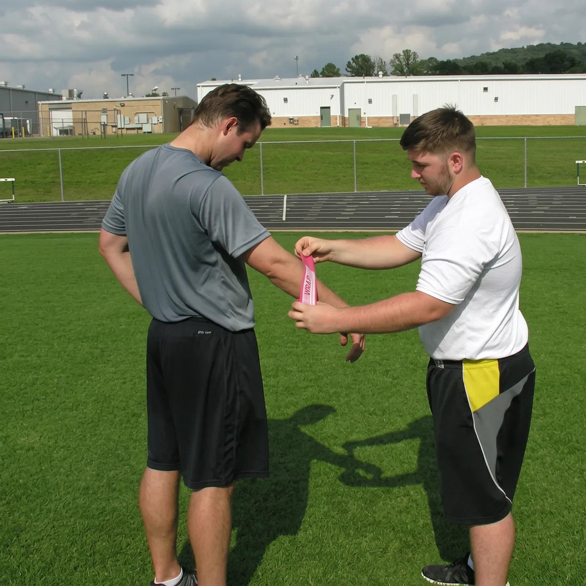 Rocket Wrap Compression Floss being wrapped around an arm, illustrating targeted compression to stimulate blood flow and support joint recovery.