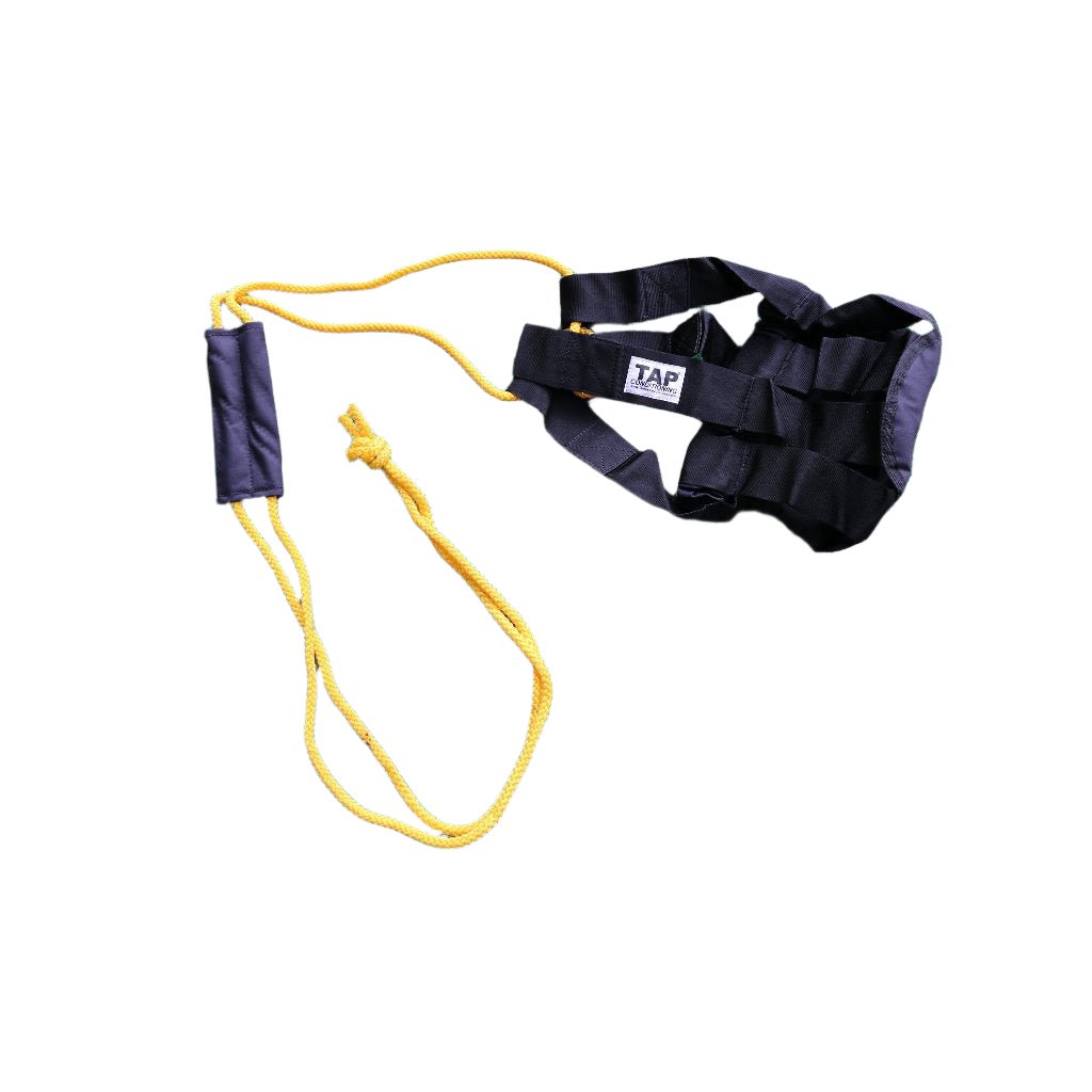 Product photo of TAP® Hammer Net: Shown is a black training net with yellow ropes and a padded handle. Medicine balls of various sizes can be securely held within the net, demonstrating its use for dynamic training exercises like slams, swings, and chops. This tool helps athletes in baseball, golf, and tennis improve rotational power, core strength, and agility.