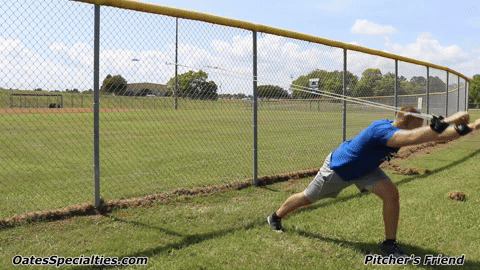 Animated GIF showing a focused athlete executing full-body chop exercises with a resistance band, targeting shoulder stability and core strength.