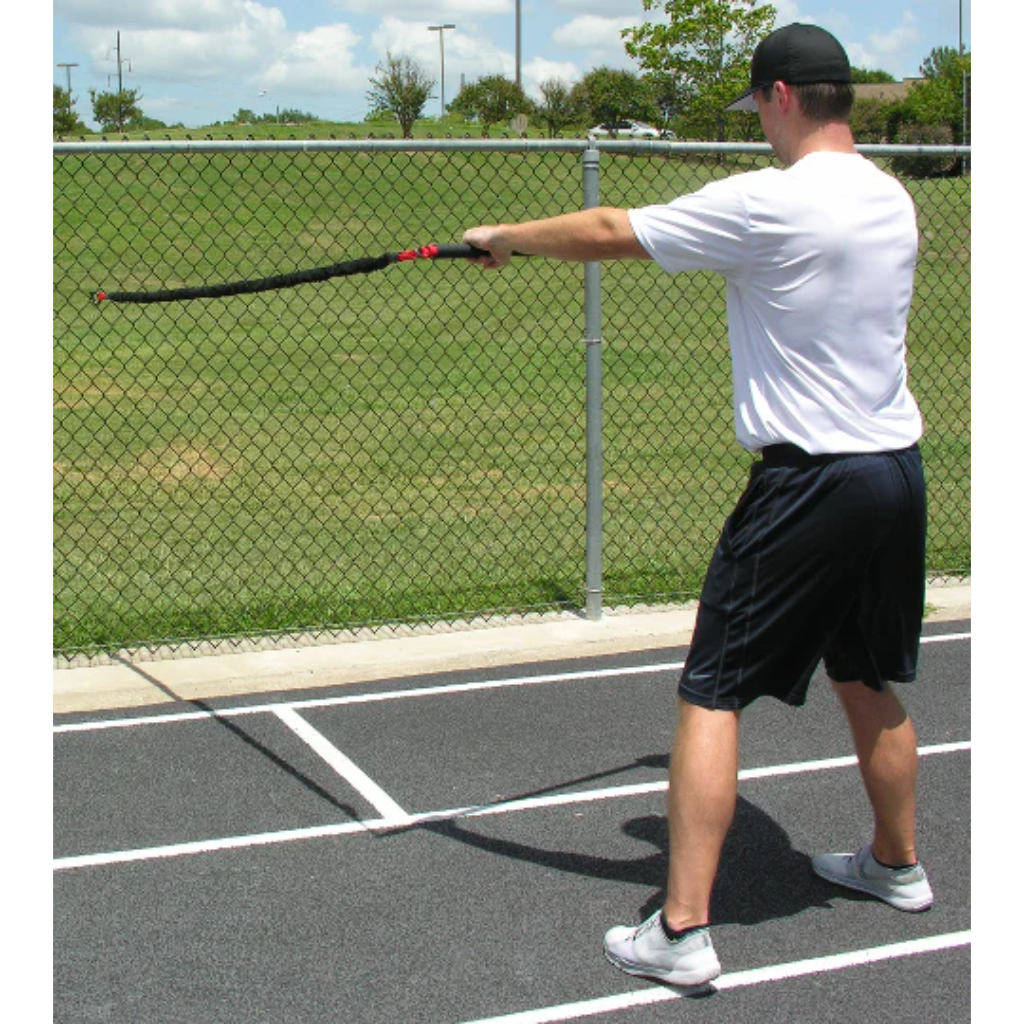 Athlete performing a one-sided resisted chest pull with the KHAOS® Pivoter, engaging upper-body strength, core stability, and controlled movement during dynamic resistance training.