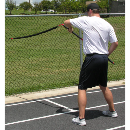 Athlete performing resisted rowing exercises with the KHAOS® Pivoter, engaging upper-body strength, core stability, and controlled movement during dynamic resistance training.