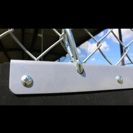 Close up shot of the Portable Plyo Mat and its hooks being suspended on a fence, as well as a shot of the screws in the Plyo Mat