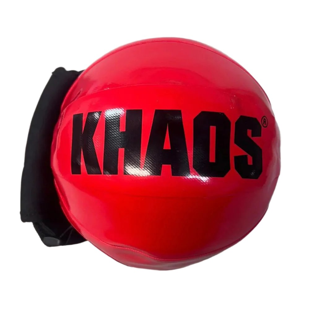 The front of the Khaos Shoulder Shaker red with a black adjustable handle. The ball is filled with water and shaken to provide perturbations and dynamically stabilize the shoulder joint. 