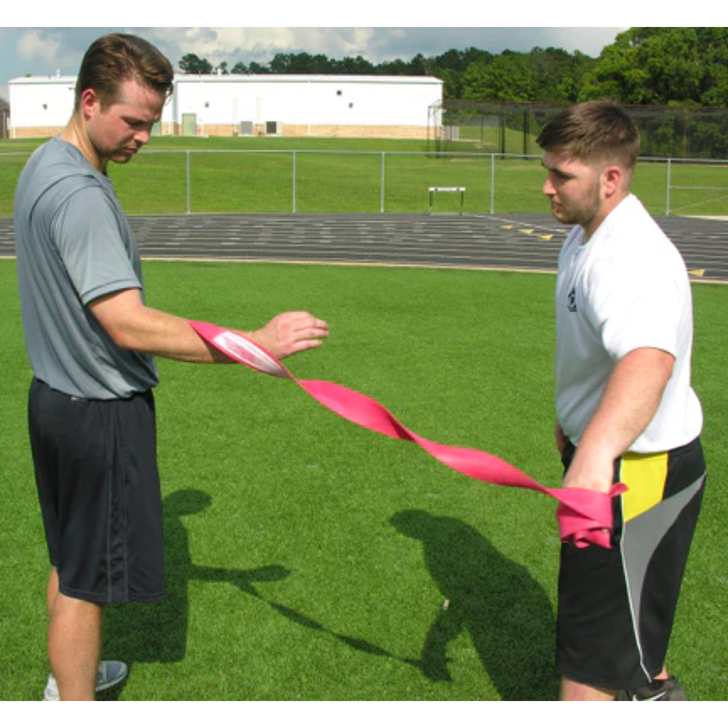 Rocket Wrap Compression Floss being removed from the arm, highlighting the release phase that triggers rapid blood flow return to the targeted area for enhanced recovery.