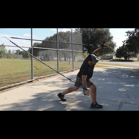 An athlete performing full body airplane exercises to really improve on core and shoulder strength and stability.