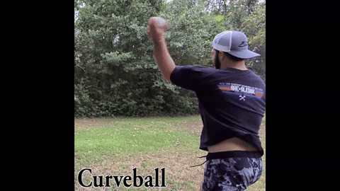 Athlete training with the Spinaid to refine their curveball, using visual feedback to assess spin efficiency and make targeted adjustments for pitch control.
