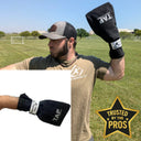 TAP® Baseball Training Sock: Field view of a modified ball-hold program, utilizing a frictional constraint to force advanced scapular stabilization and build posterior shoulder deceleration capacity.