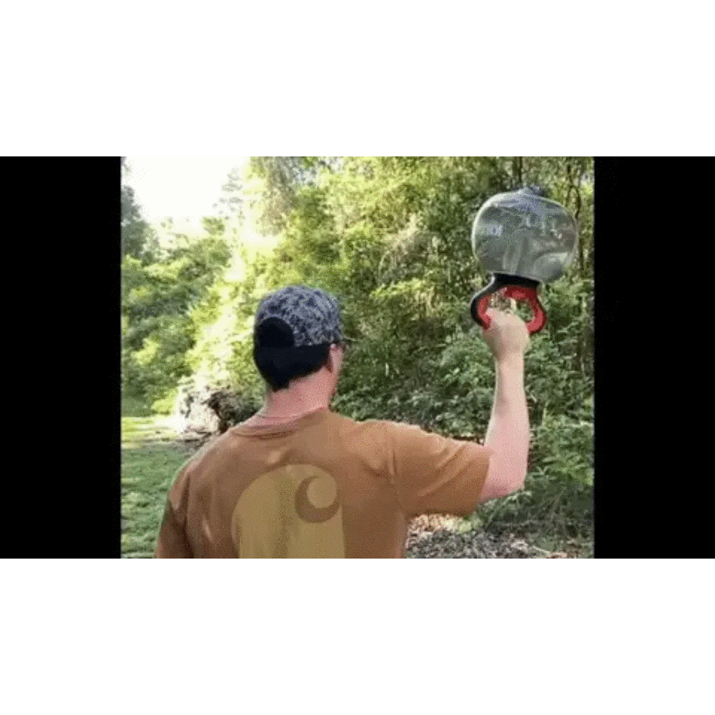 Waterbell held upside down at 90 degrees, creating dynamic resistance for shoulder stability and controlled arm movement