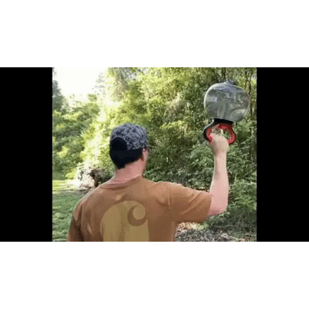 Waterbell held upside down at 90 degrees, creating dynamic resistance for shoulder stability and controlled arm movement