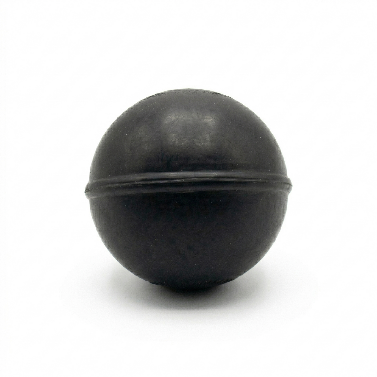 TAP® Weighted Massage Ball — 8 oz black version designed for deep tissue massage and myofascial release.