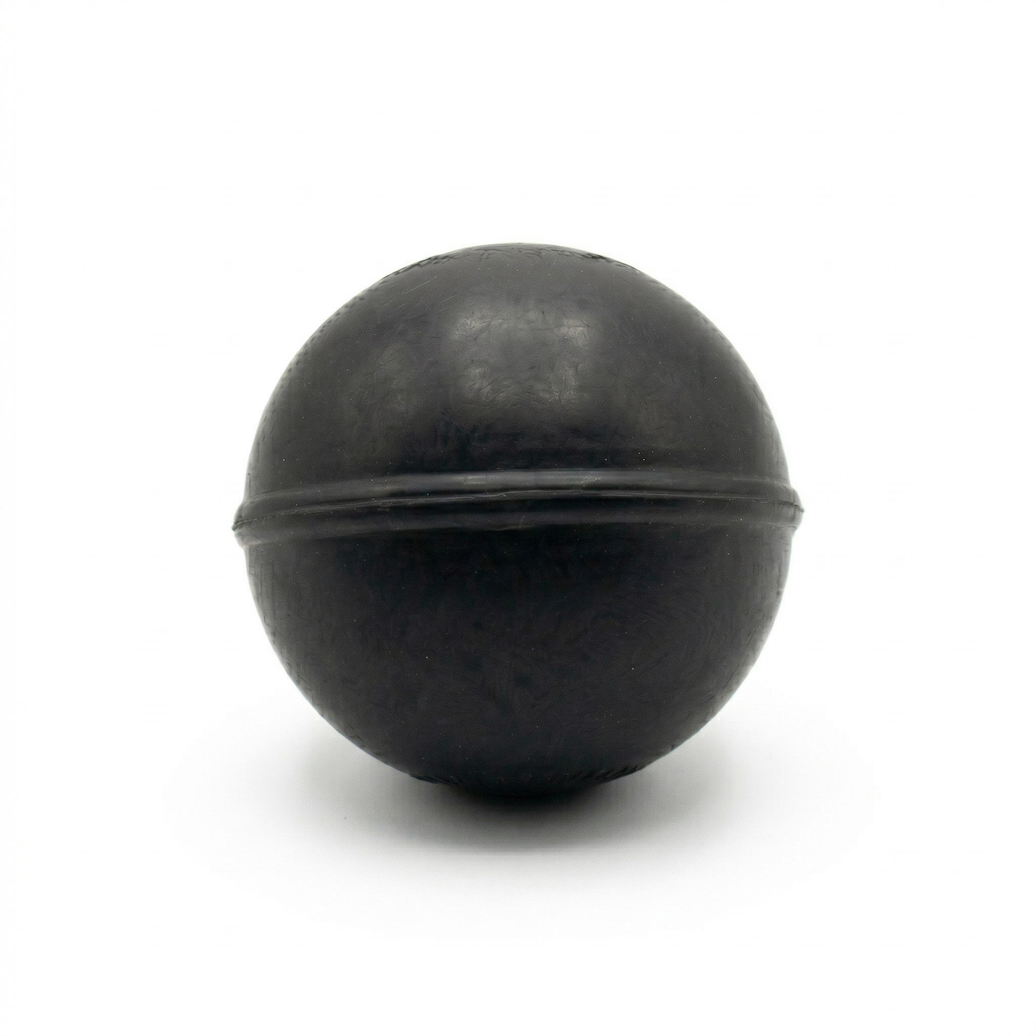 TAP® Weighted Massage Ball — 8 oz black version designed for deep tissue massage and myofascial release.