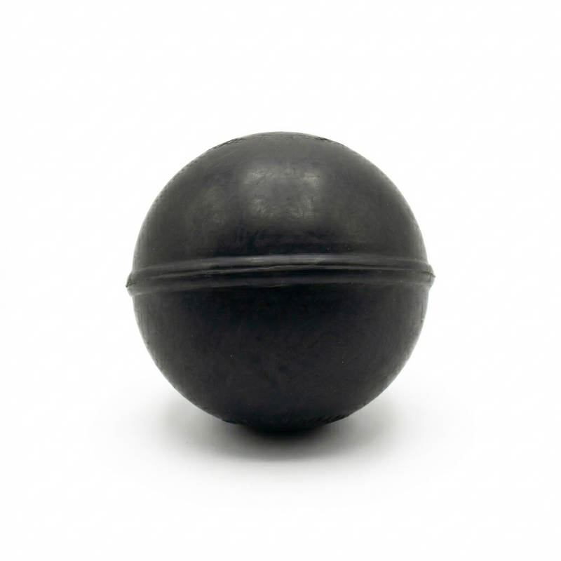 TAP® Weighted Massage Ball — 8 oz black version designed for deep tissue massage and myofascial release.