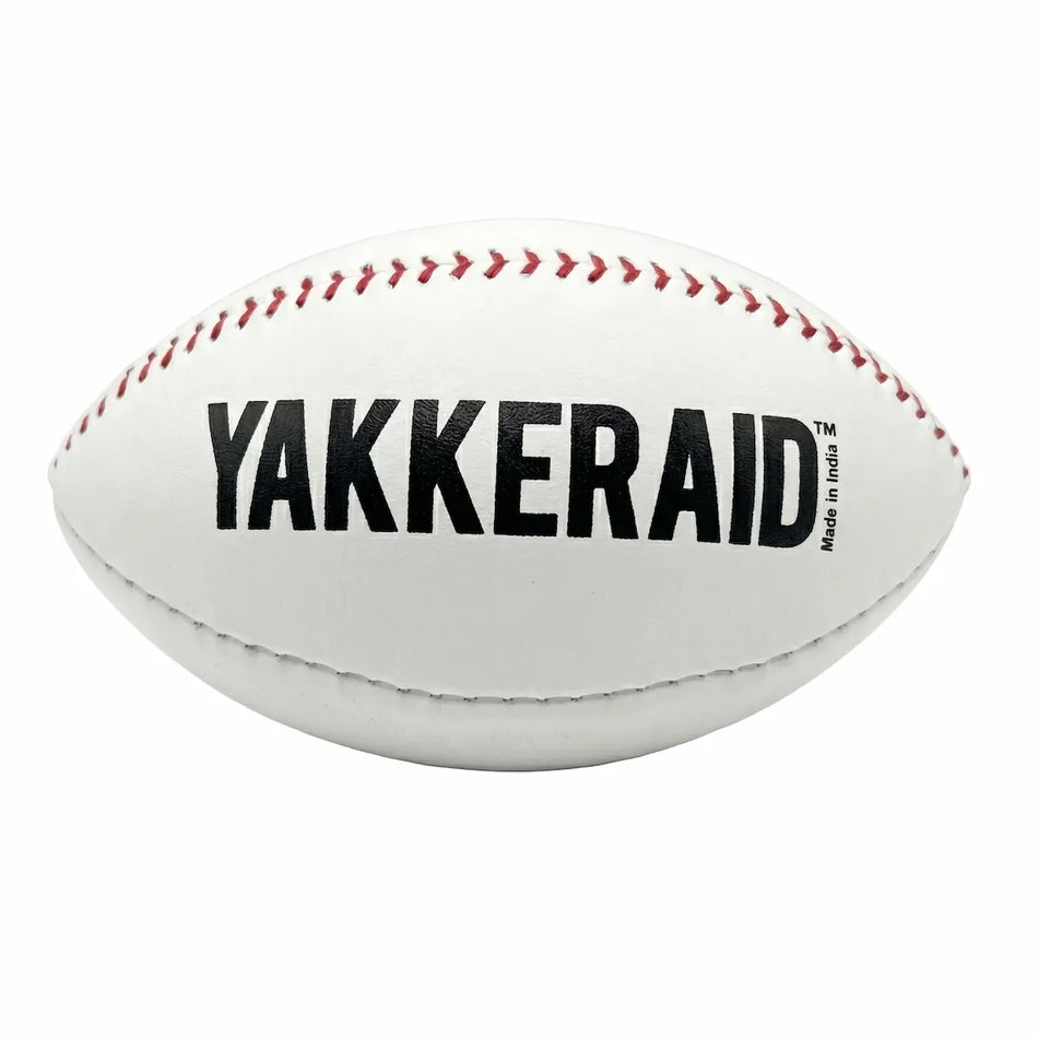 TAP® YAKKERAID football‑shaped leather baseball pitching trainer showing front view, laces, and seams for slider, curveball, and changeup spin‑feel work.