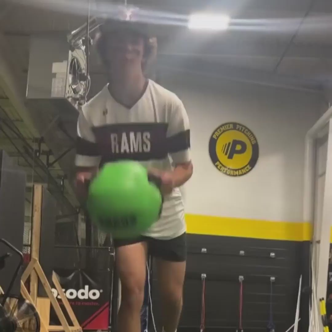 Athletes performing dynamic stabilization and core strength drills using the TAP® Water Ball. Video demonstrates baseball-specific movements including overhead lunges, rotational tosses, and single-leg balance exercises to improve trunk stability and kinetic chain synchronization.