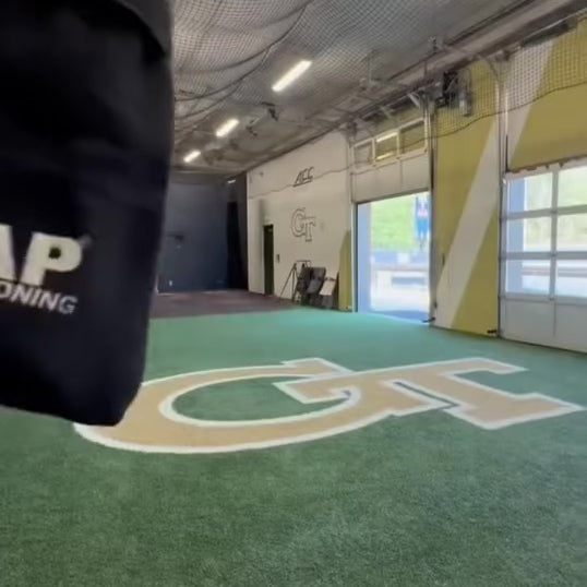 TAP® Baseball Training Sock: Collegiate athlete demonstrating neuromuscular self-organization and path-consistency constraints during a high-intent throwing progression.