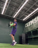 Pitching core training: Athlete uses shifting water of Khaos Bag for enhanced muscle stimulation.