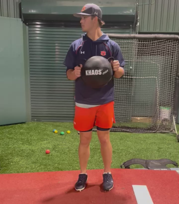 Collegiate pitcher using the KHAOS Water Ball to drive core stabilization through the pitching delivery, harnessing unstable water resistance to enhance throwing power, trunk strength, and mound-specific stability.