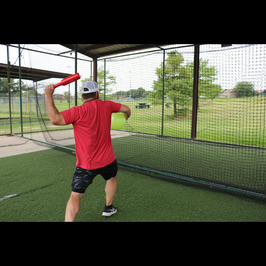 Connector Throwing Club being held in the power position with the arm up and ready to go forward. 