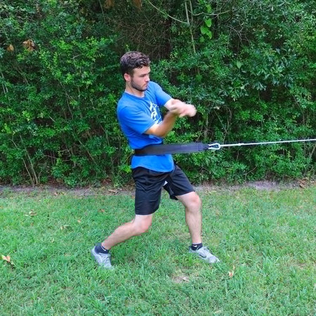 The Donley Hip pin is assisting hip rotation in the middle of the swing to force a faster hip rotation and swing.