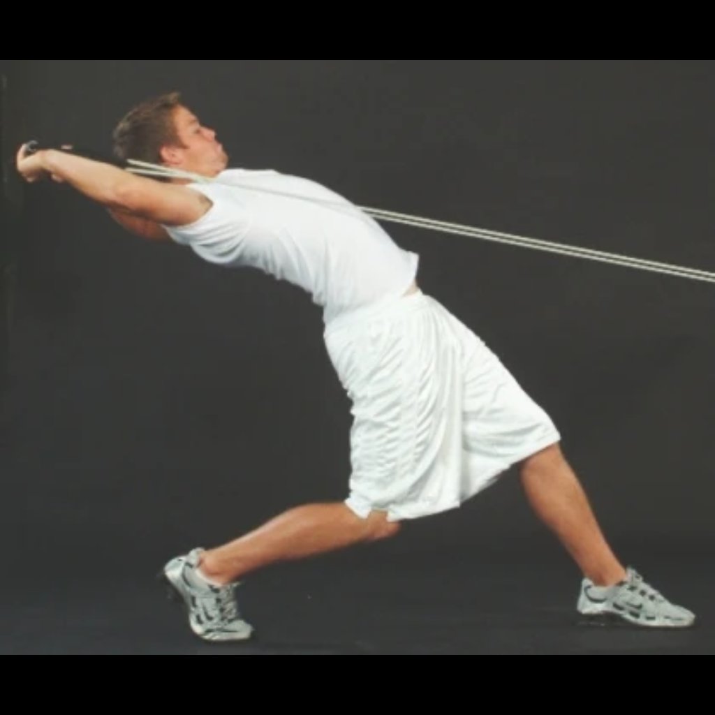 Athlete performing full-extension pull with Dynamic Arm Tubing to build torso strength and enhance flexibility.