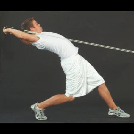 Athlete performing full-extension pull with Dynamic Arm Tubing to build torso strength and enhance flexibility.