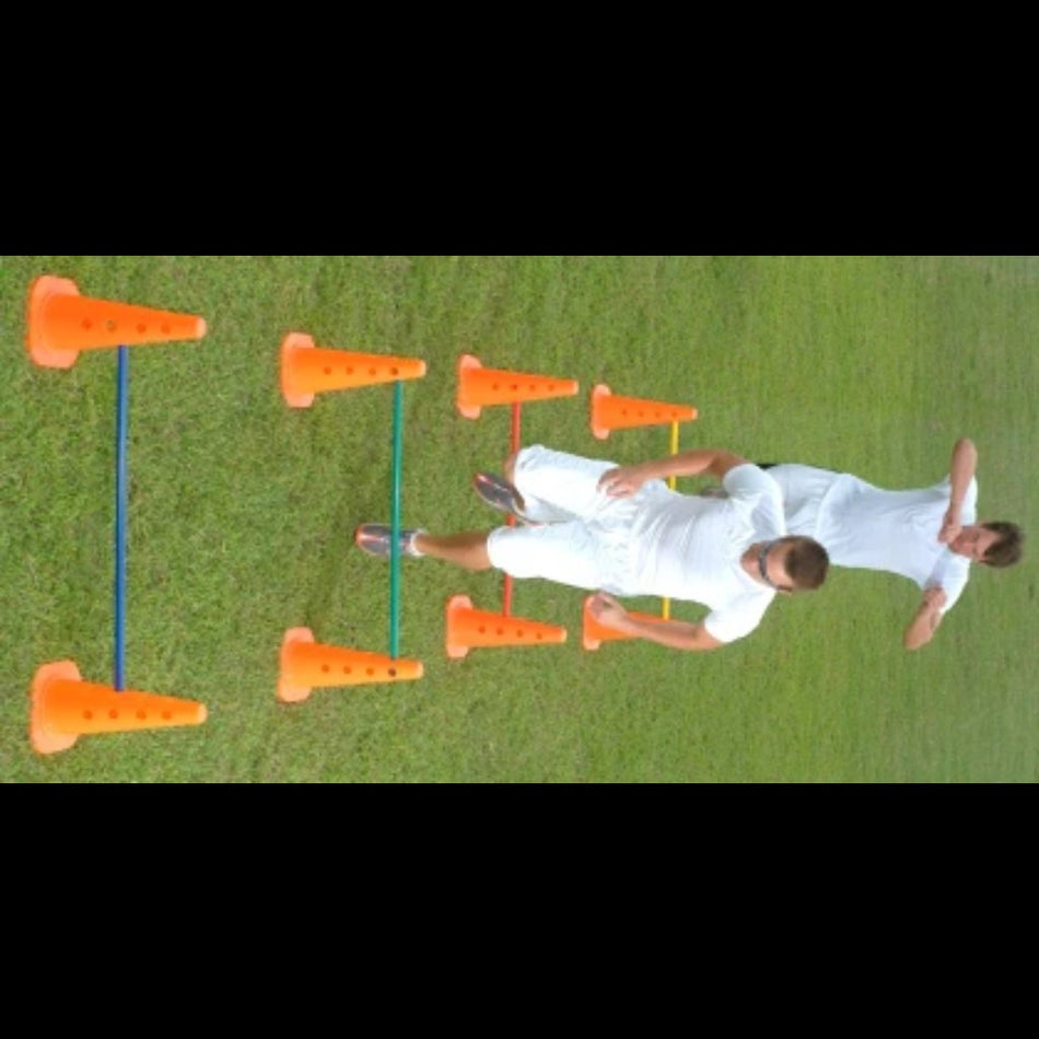 Hurdle Cone and Crossbar Set in use as athletes perform various step-over drills for speed and agility training that has a direct impact with on field performance.
