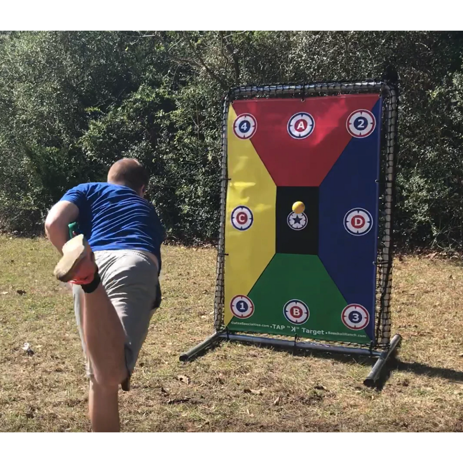 TAP K Target being thrown at by athlete with a weighted ball while being mounted on a safety net and frame. It is being used to enhance command. 